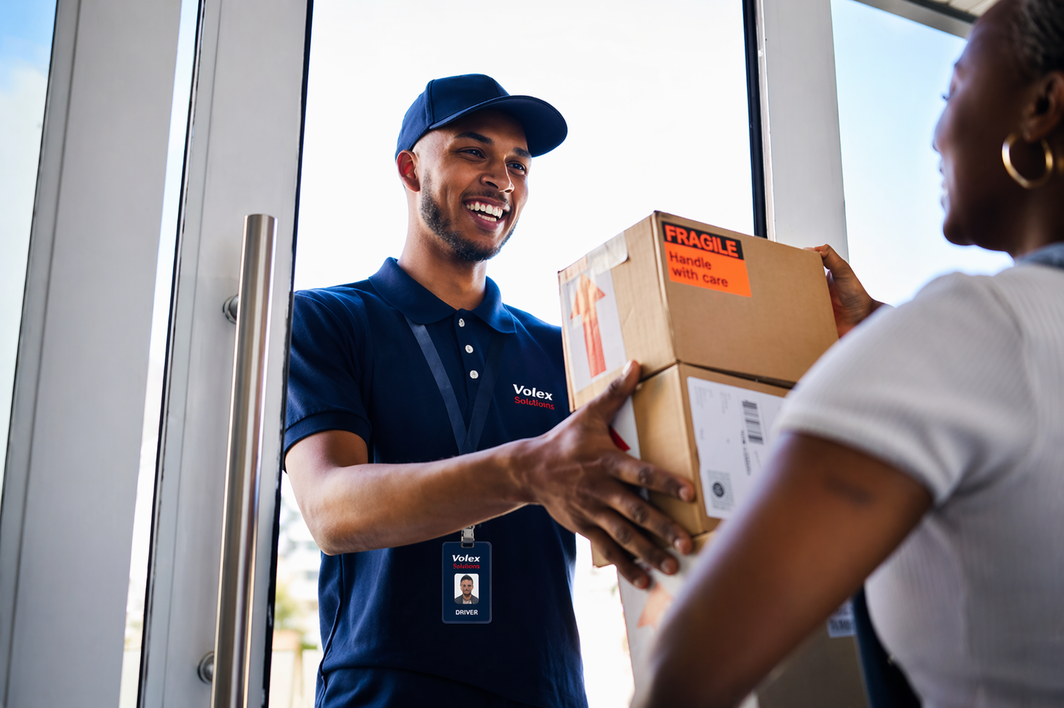 Volex Solutions last-mile delivery with driver handing package to customer